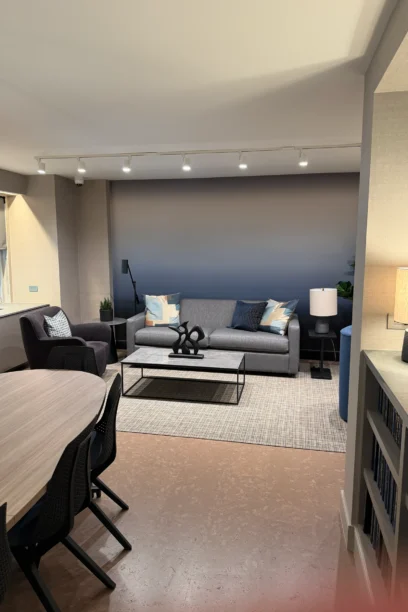 View from the dining table toward the sofa seating area in Cambridge Lounge.